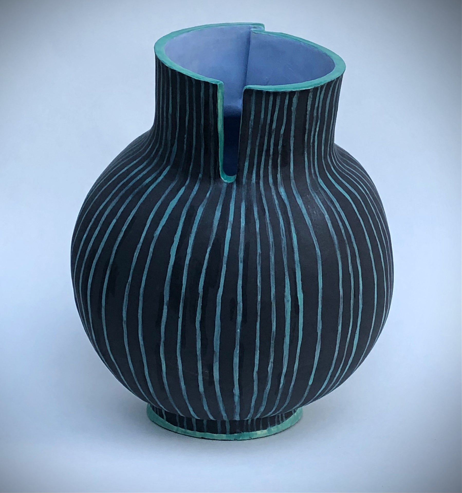 Black and green bent forward by Judy DeSimone