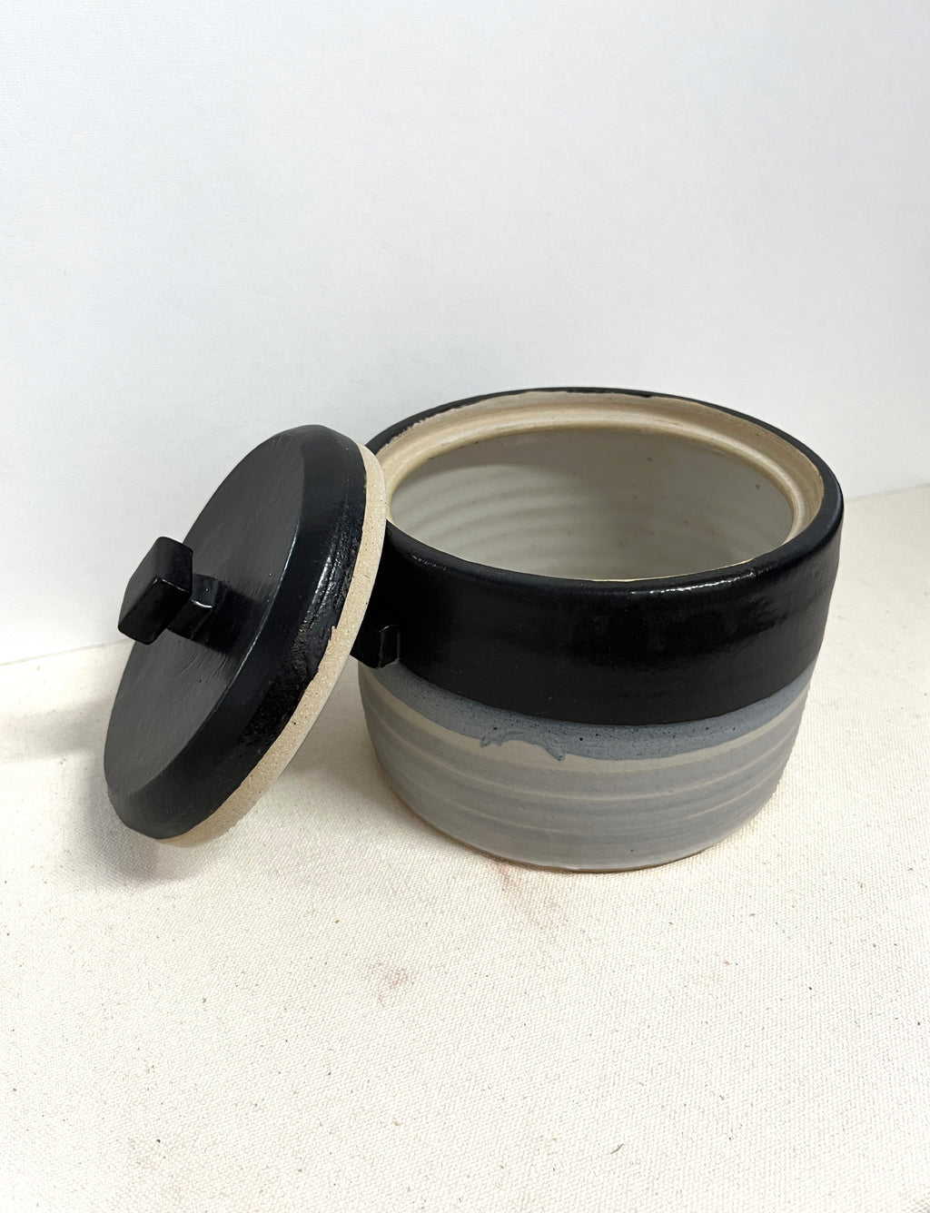 Black and Grey Jar by William Bowser