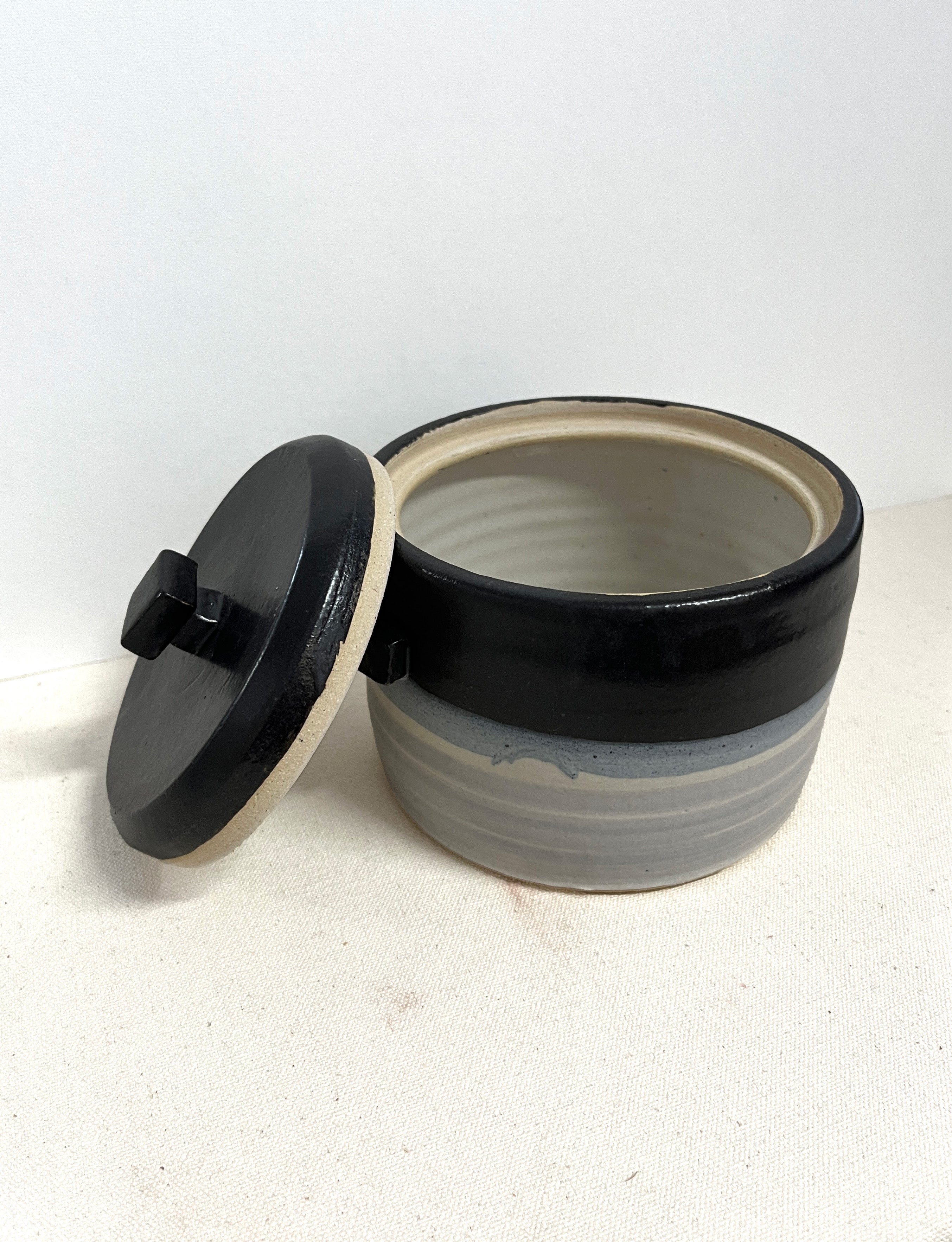 Black and Grey Jar by William Bowser