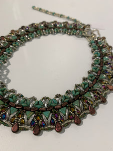 Green and purple accented collar necklace